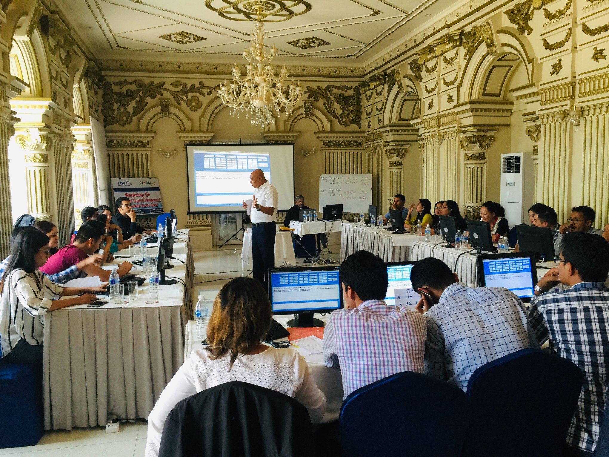 Program on Integrated Treasury Management with Simulated Bourse Game